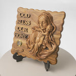 Load and play video in Gallery viewer, Olivewood “God bless our home” with Jesus and Mary Plaque

